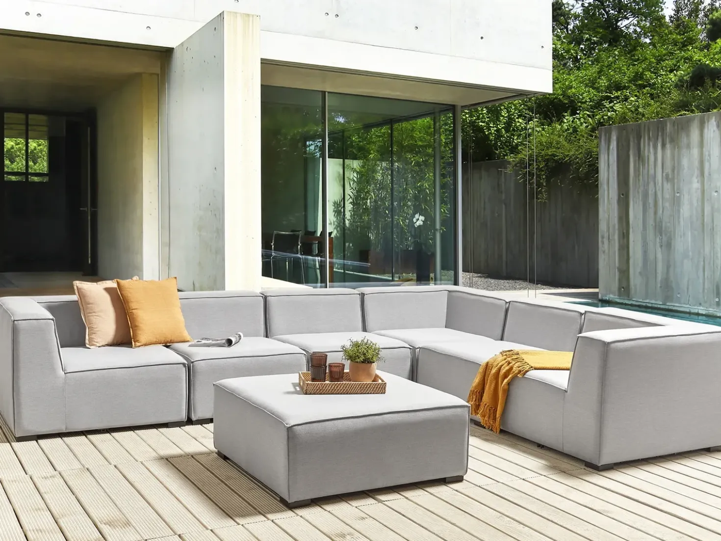 Divano angolare da giardino con pouf 7 posti AREZZO Lato Sinistro Modulare Grigio chiaro