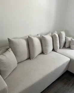 Divano letto angolare 3 posti LUSPA Tessuto Beige chiaro con contenitore Lato Sinistro