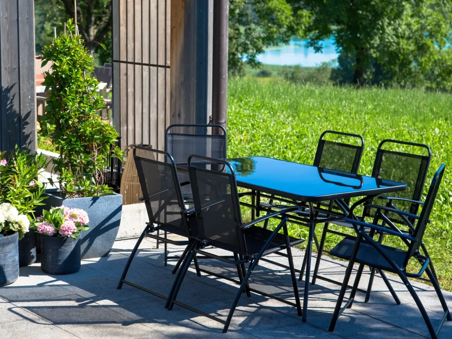 Tavolo da pranzo da giardino LIVO 140 cm 80 cm Vetro Nero